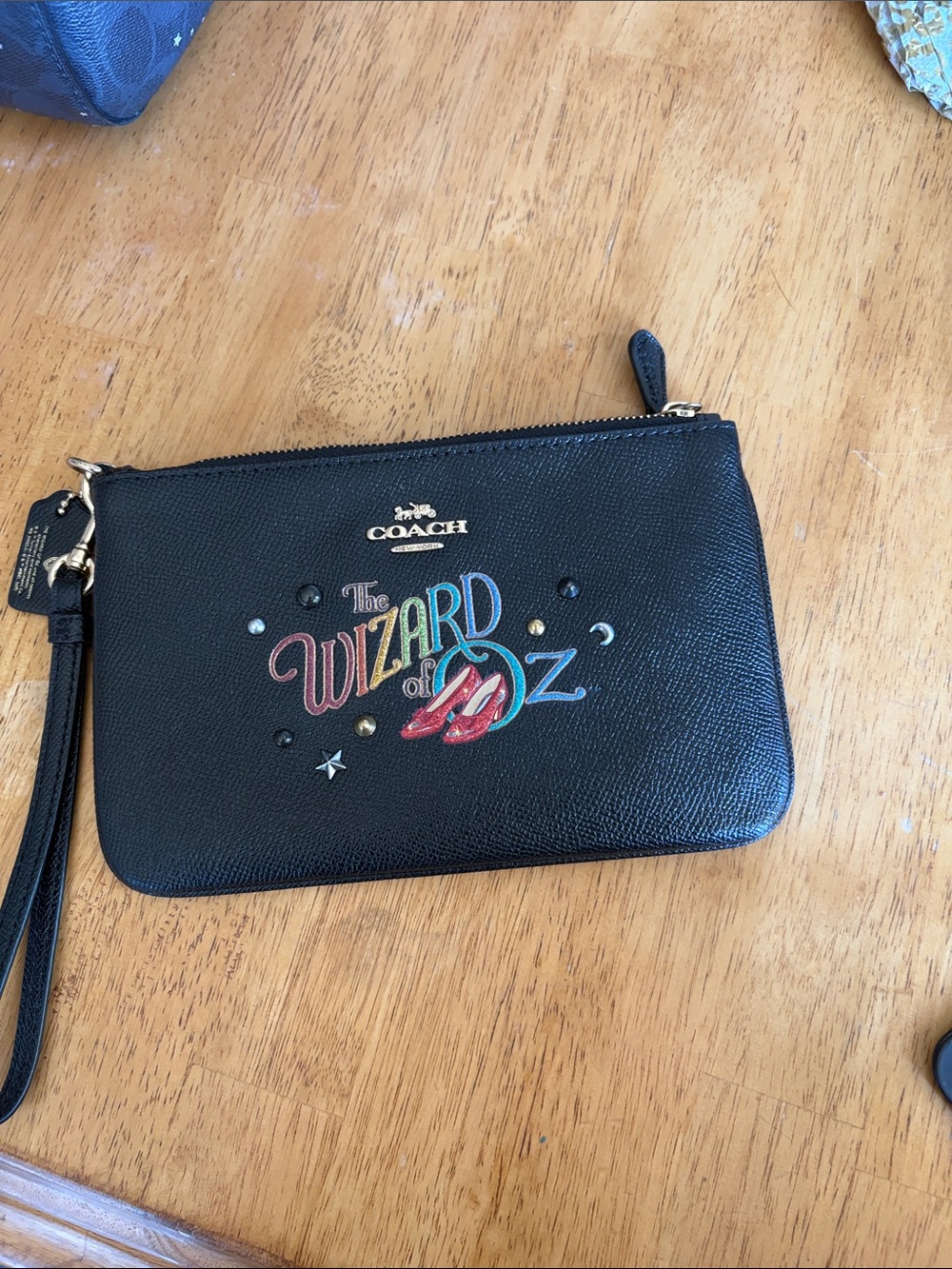 Coach Black Leather 'Wizard of Oz' Multicolor Logo Wristlet